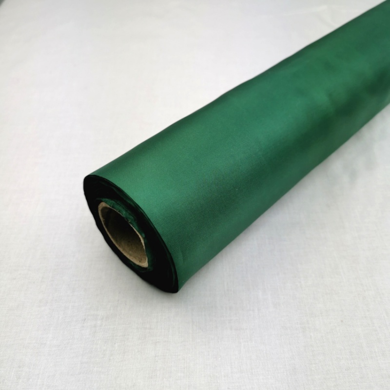 50 Metre roll of Bottle Green Habitue. Cheap fabric for draping, Silky